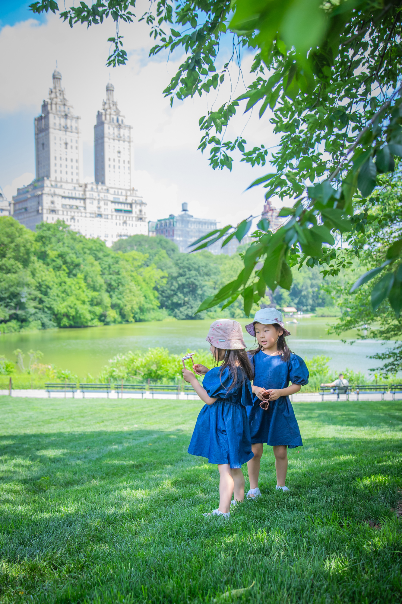 Lifestyle family photography in Central Park, capturing candid moments and natural expressions.
